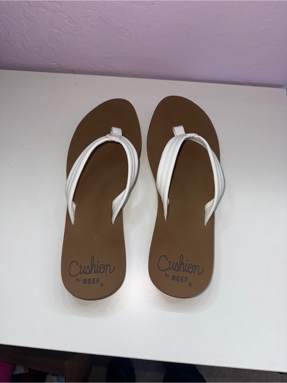 Reef Women's White cushion breeze flip flops